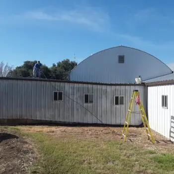Professional pressure washing building exterior