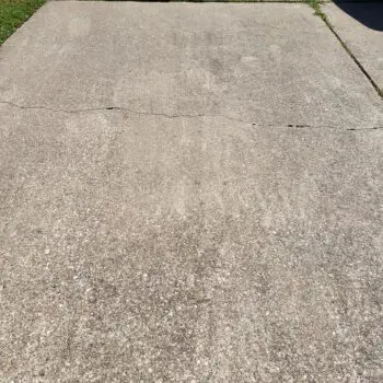 Concrete driveway with visible cracks