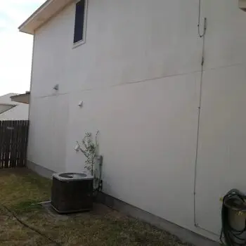 House exterior wall pressure washing